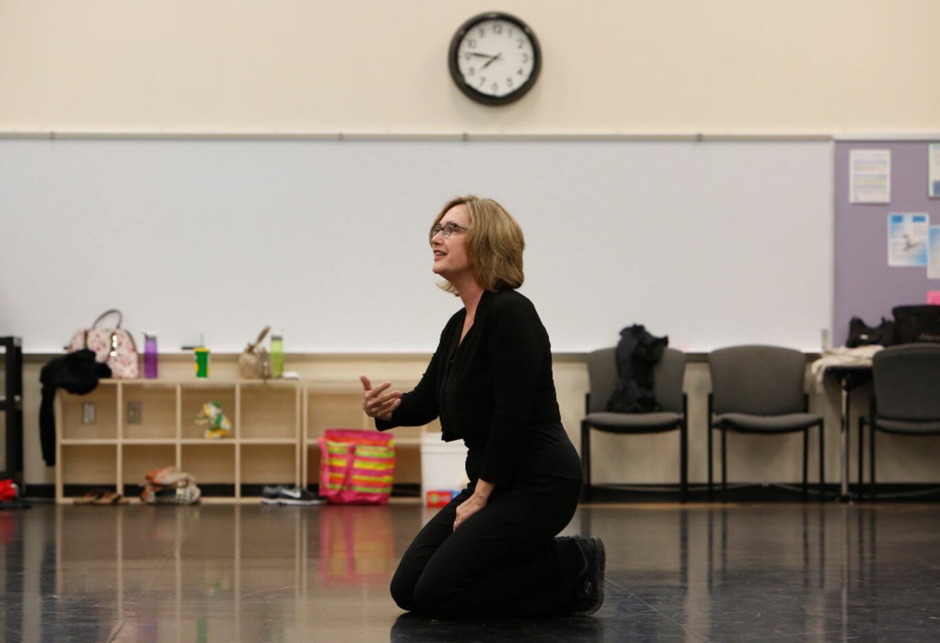 Elledanceworks co-founder Michele Hanlon talks to company members during a rehearsal at...