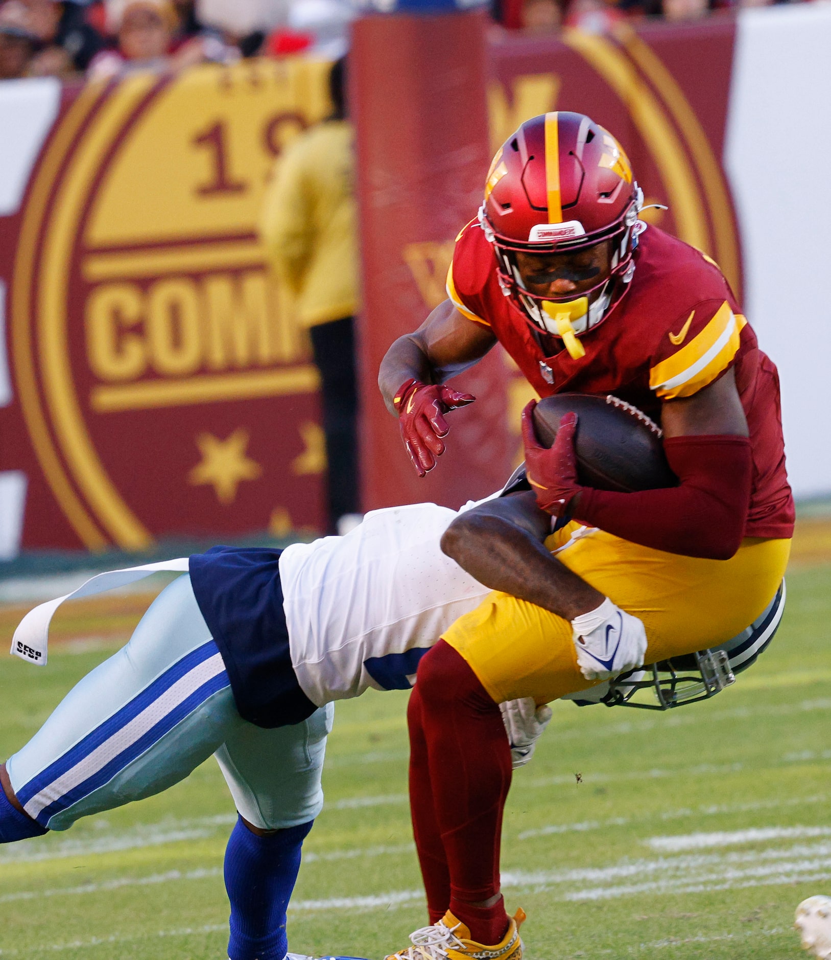 Washington Commanders wide receiver Terry McLaurin (17) is tackled by Dallas Cowboys...