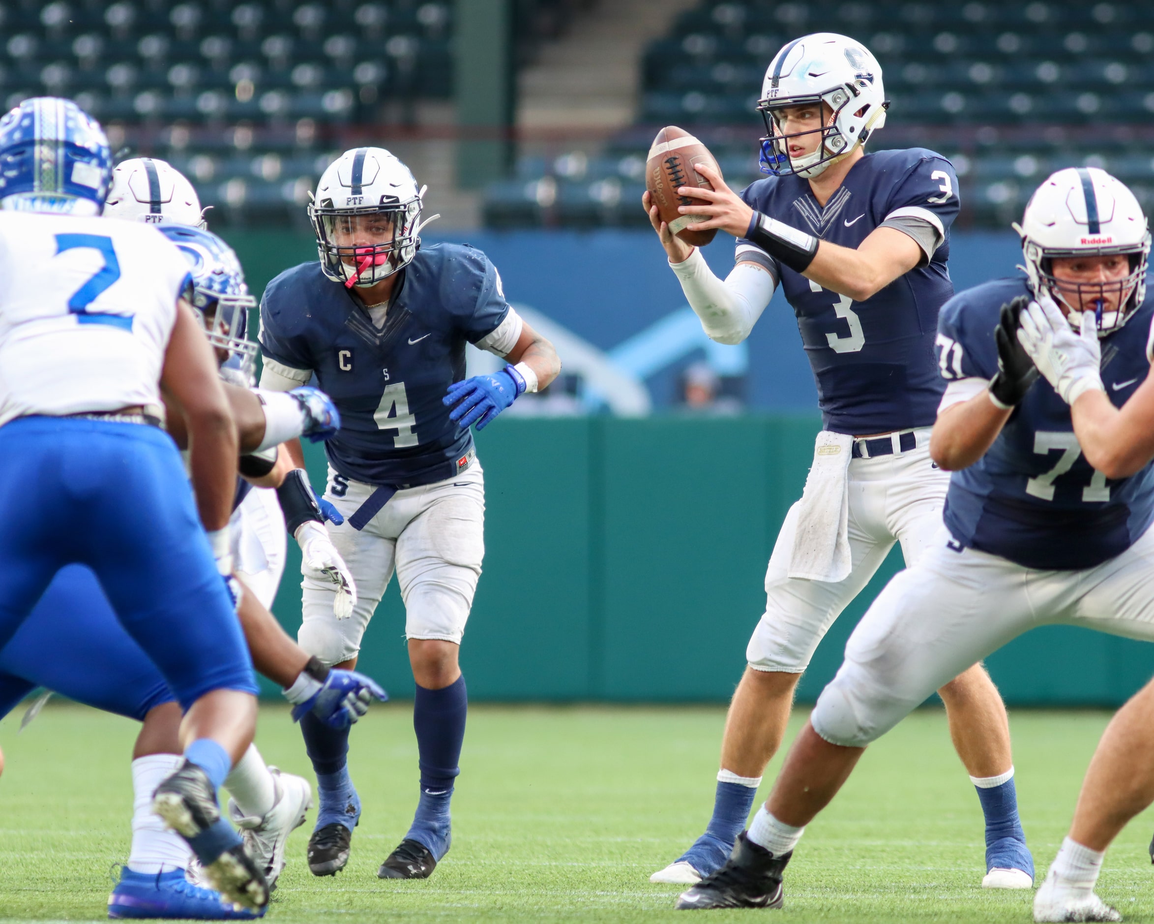 Fort Worth All Saints quarterback Hampton Fay (3) catches the snap with running back Montaye...