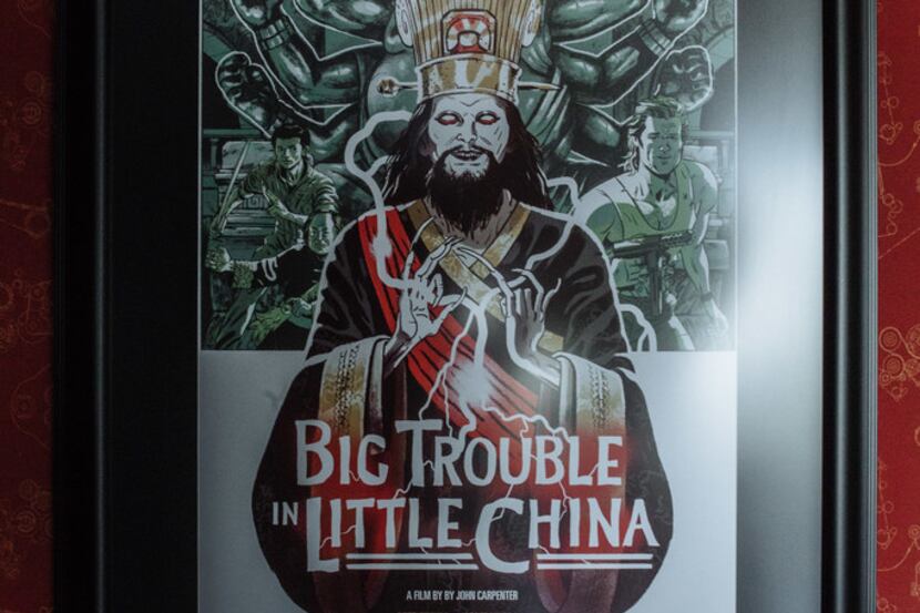 A Mondo movie poster for the John Carpenter film "Big Trouble in Little China," on display...