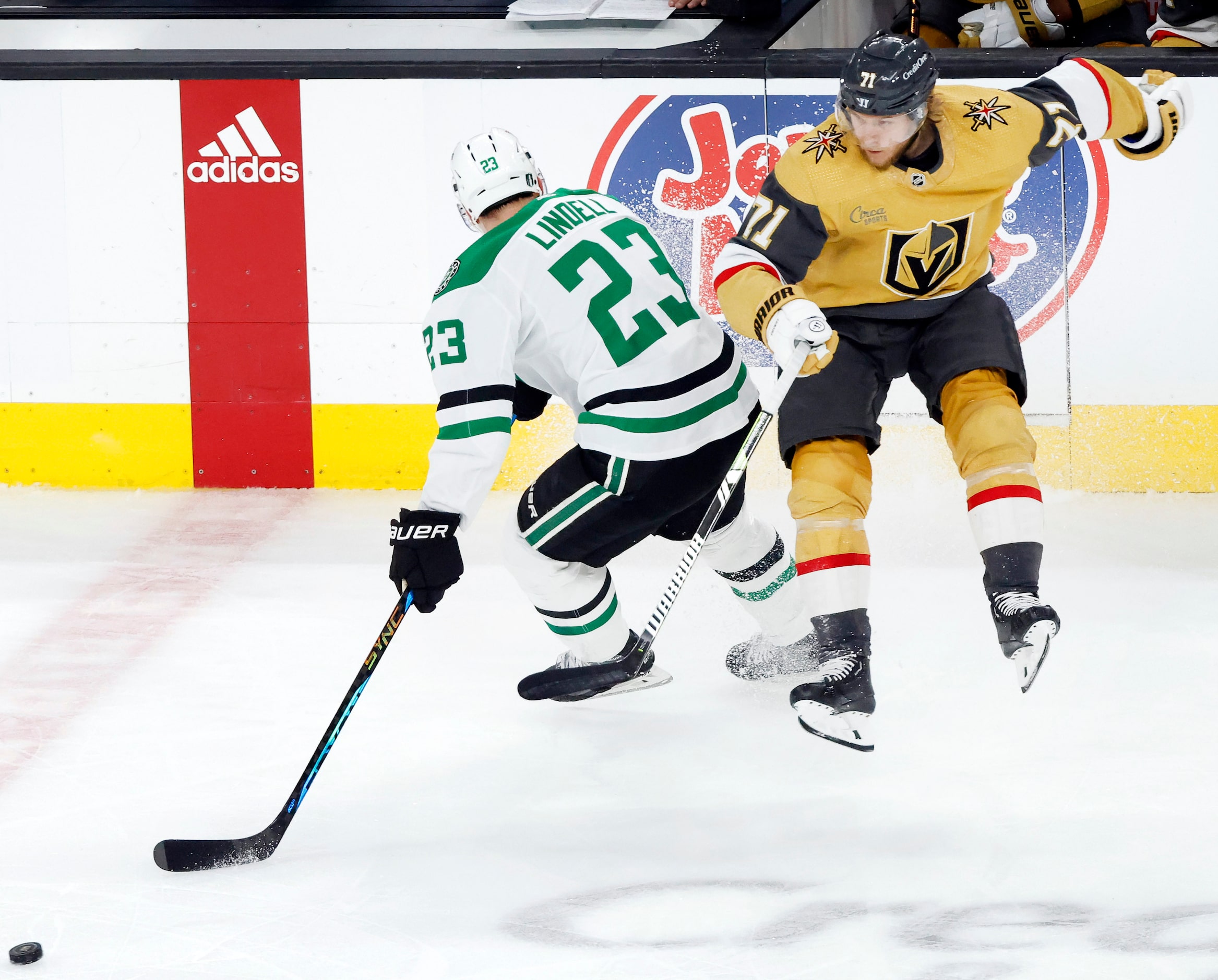 Dallas Stars defenseman Esa Lindell (23) collides with Vegas Golden Knights center William...