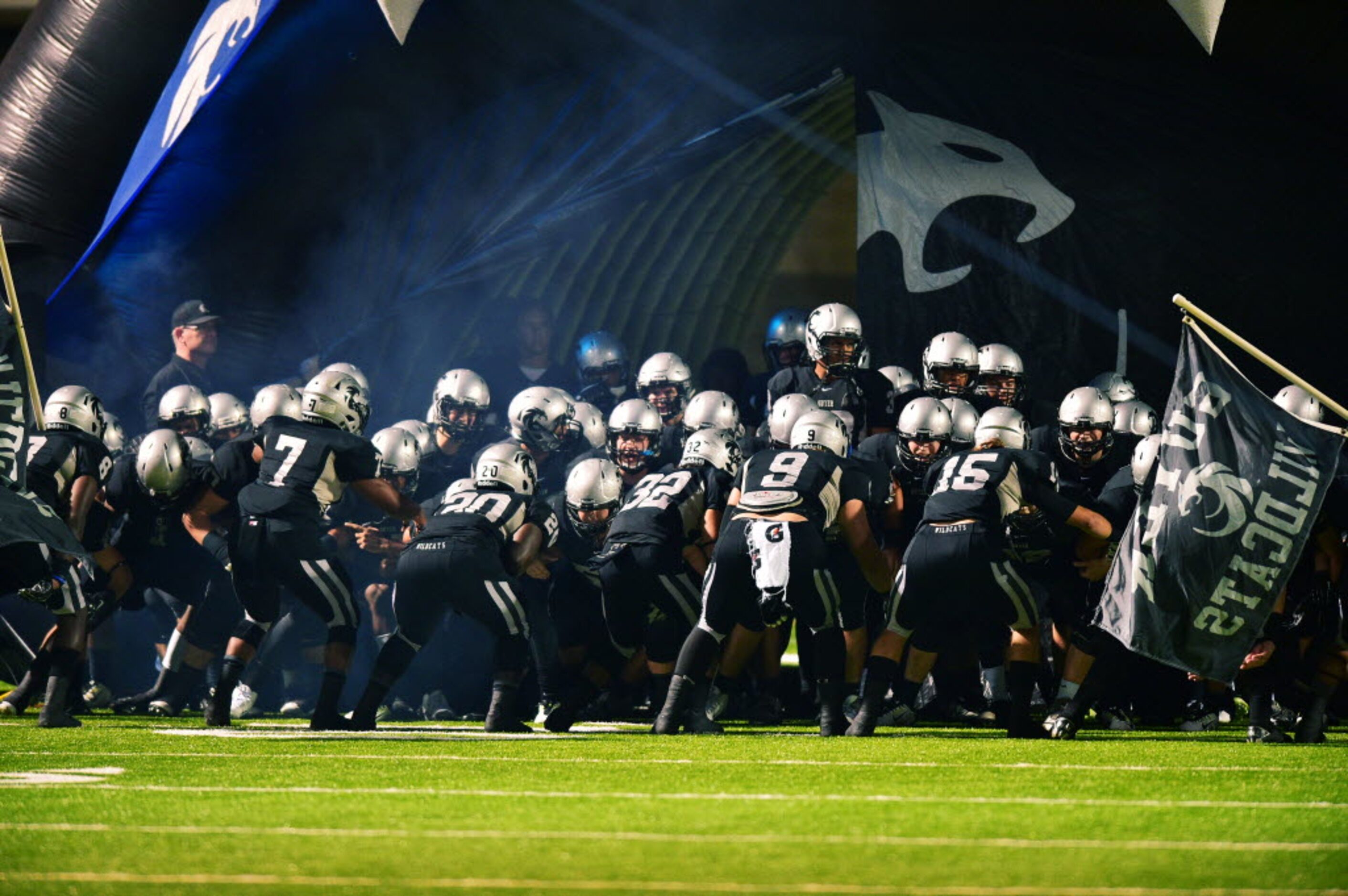 The Guyer Wildcats get pumped-up in their tunnel before taking the field against Ryan,...