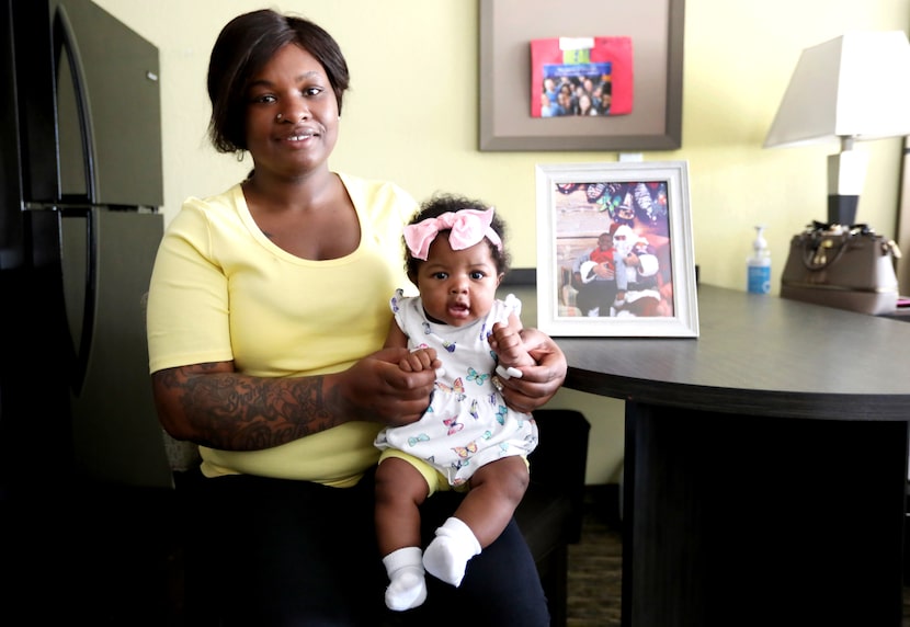 Na'Tiffany Thomas, with her 4-month-old daughter, Natoria, at her apartment at Family...