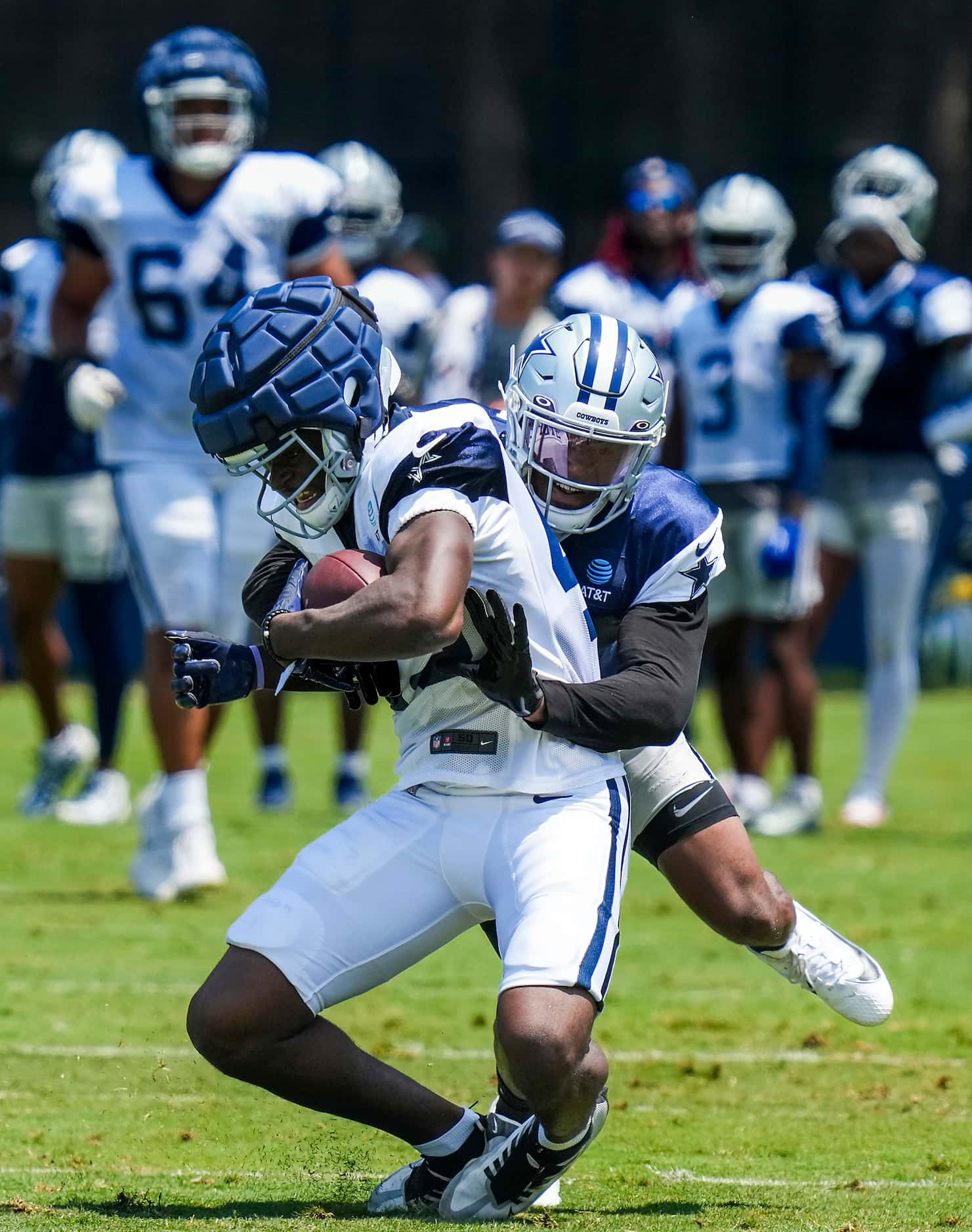 Dallas Cowboys wide receiver John Stephens Jr. (49) is brought down by cornerback Kelvin...