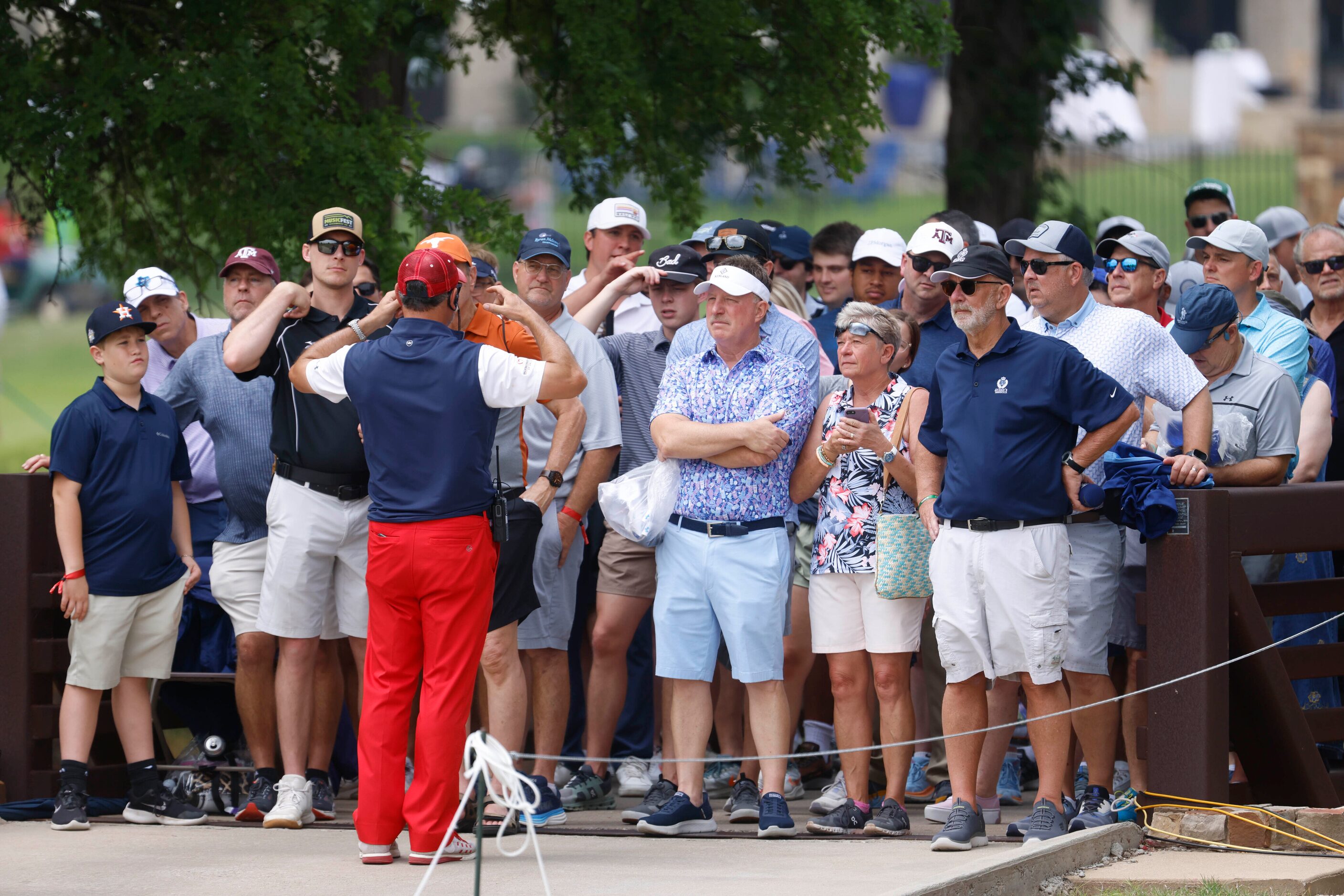 People wait on the bridge during the second round of the AT&T Byron Nelson at TPC Craig...