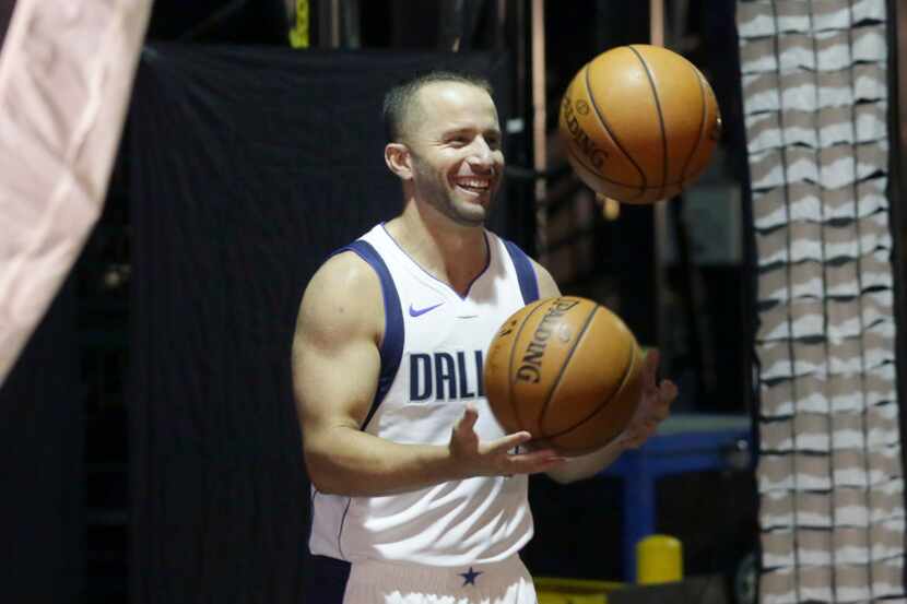 Dallas Mavericks guard J.J. Barea juggles for a photo during an NBA basketball team media...