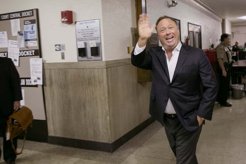 FILE- In this April 19, 2017, file photo, Alex Jones, a well-known Austin-based broadcaster...
