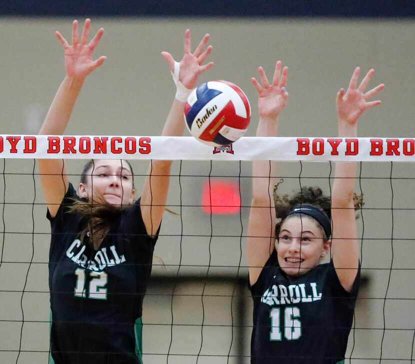 Southlake middle Annabelle Smith (12) goes up with right side Laura Brambilla (16) to...
