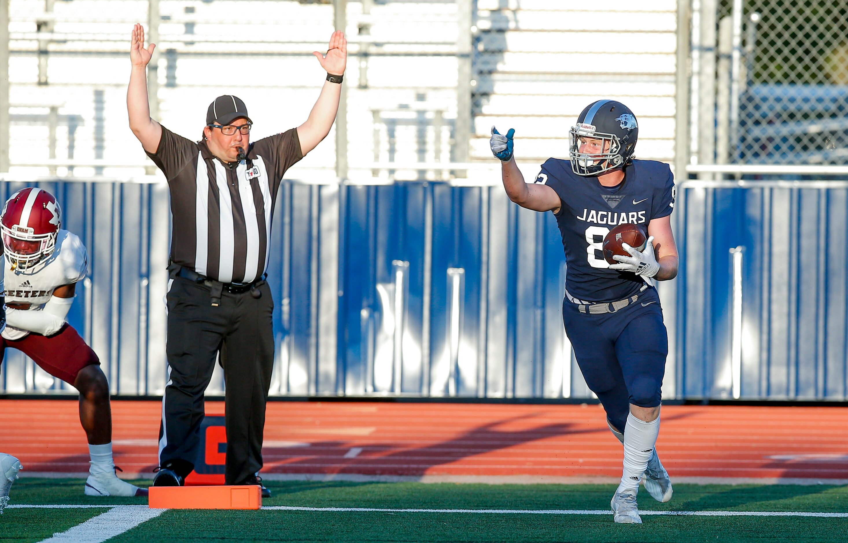 Flower Mound sophomore wide receiver Jason Welch (82) celebrates scoring a touchdown during...