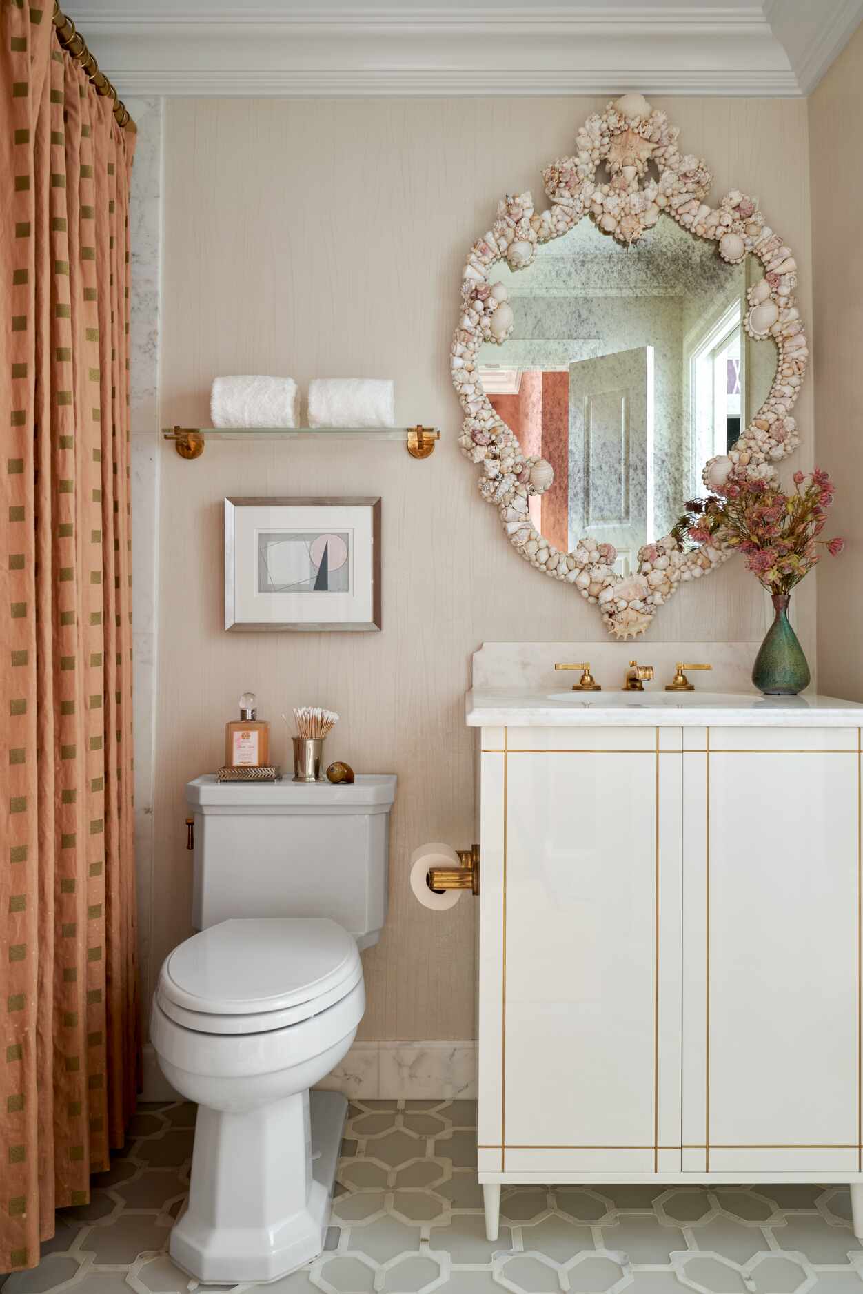 Bathroom with seashell mirror