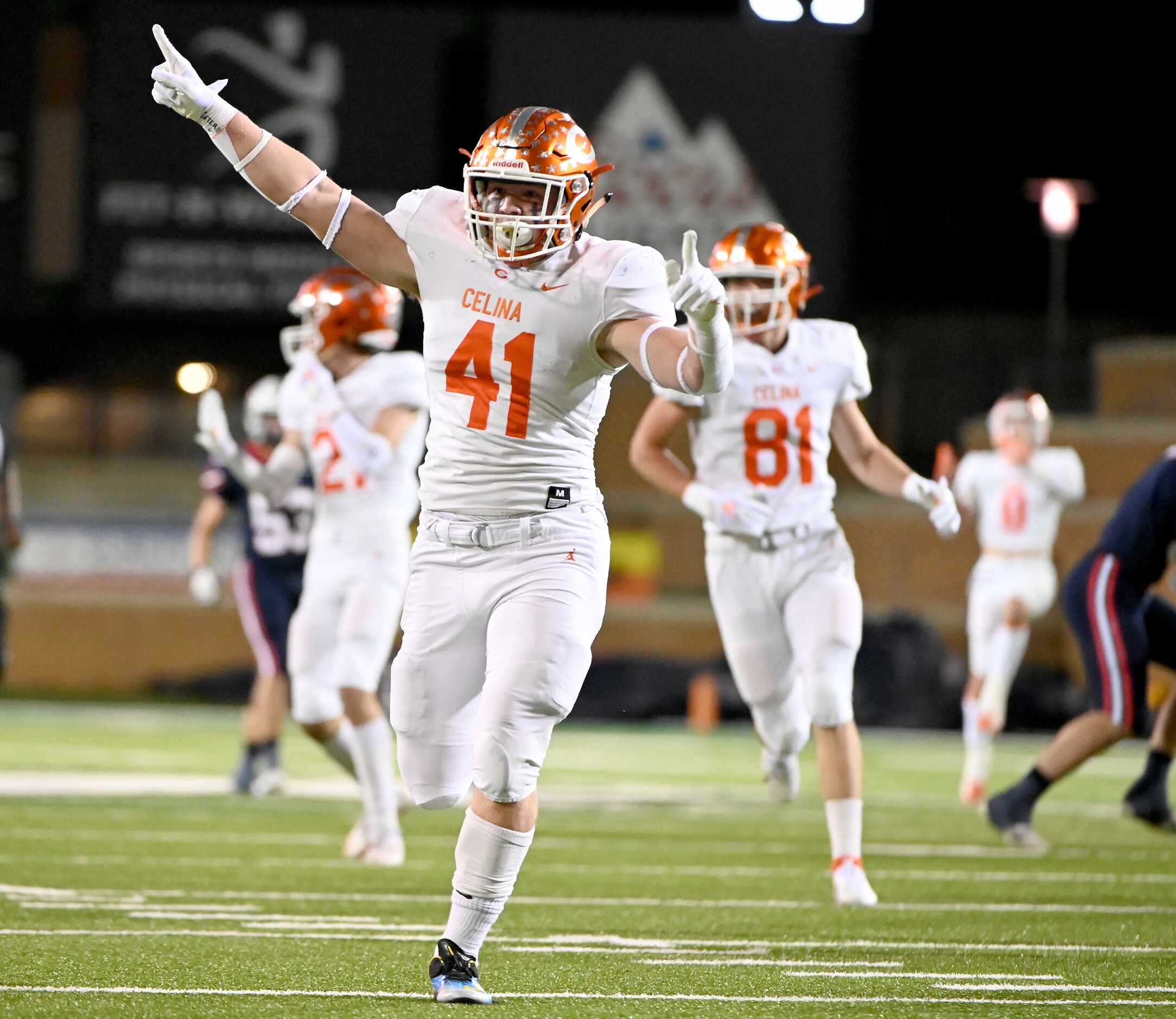 Celina's Hunter Neely (41) celebrates after blocking a punt in the first half of a Class 4A...