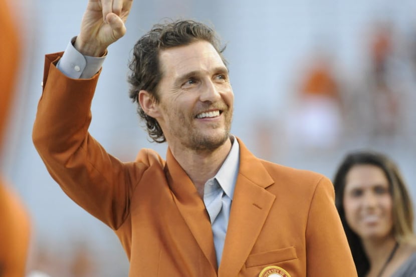 Oct 18, 2014; Austin, TX, USA; Actor Matthew McConaughey greets fans prior to kickoff...