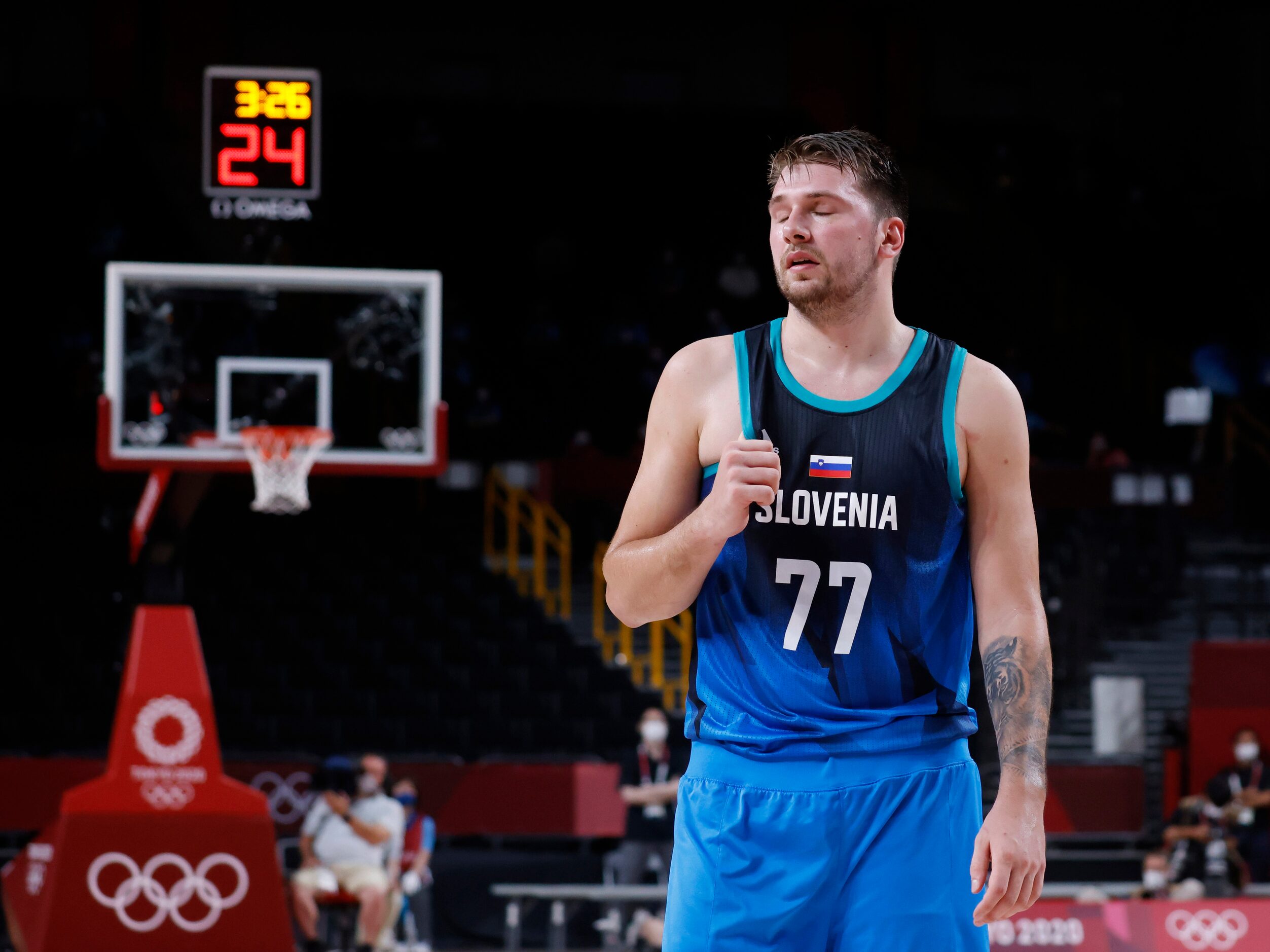 Slovenia’s Luka Doncic (7) reacts after a play in a game against France’s during the second...