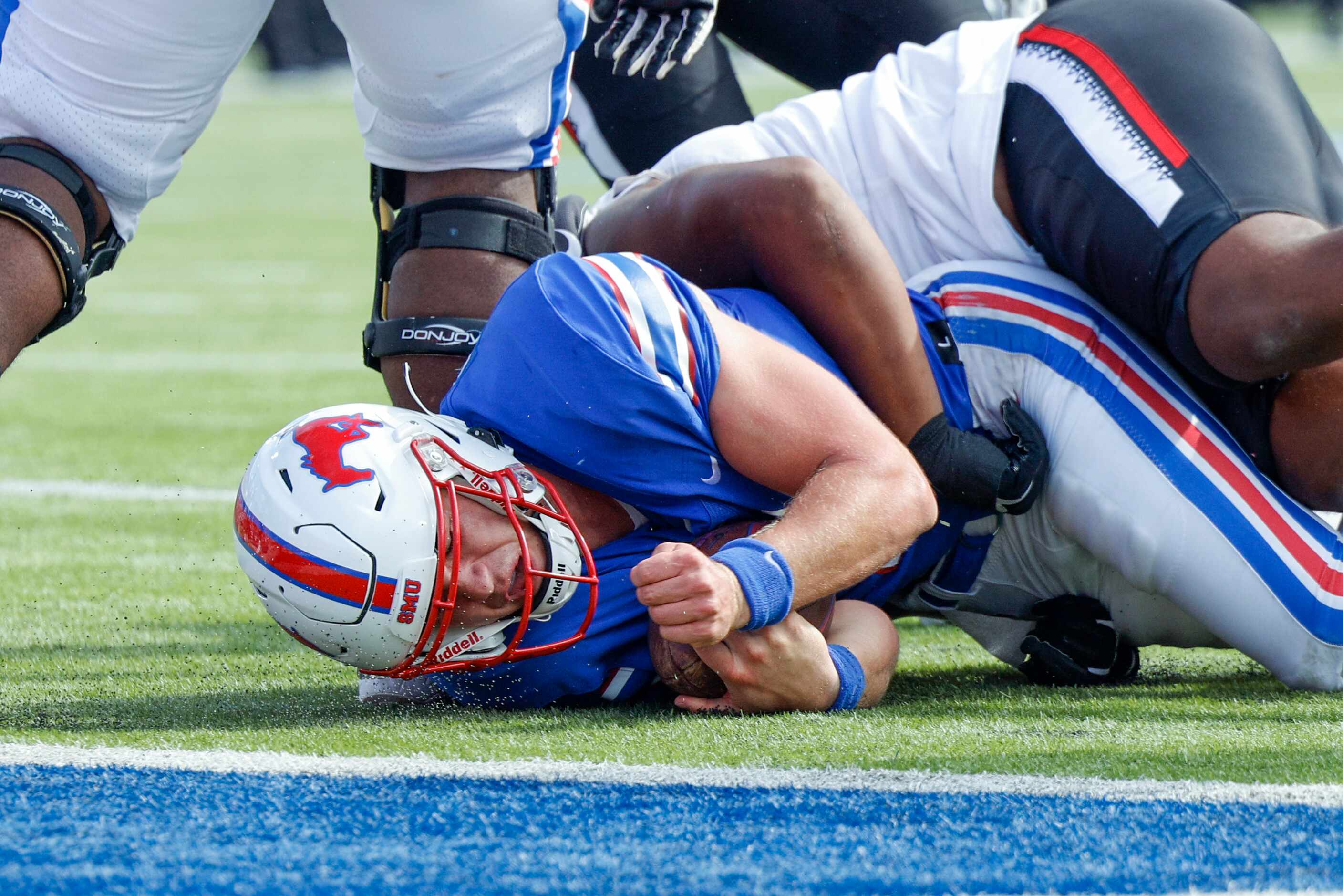 SMU quarterback Preston Stone (2) runs the ball during the second half of an NCAA football...