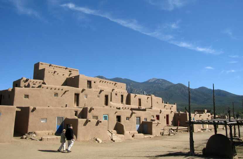 This October 2012 photo shows adobe dwellings at the Taos Pueblo in Taos, N.M., a UNESCO...