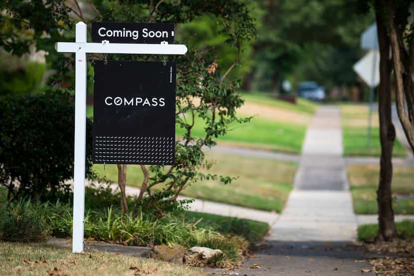 A sign informing buyers that a home was set to go on sale in the Lakewood neighborhood of...