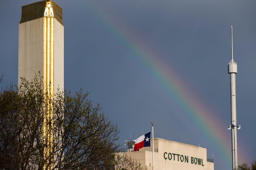 A rainbow stretches over the Cotton Bowl stadium in Fair Park onMarch 18, 2018, in Dallas. 