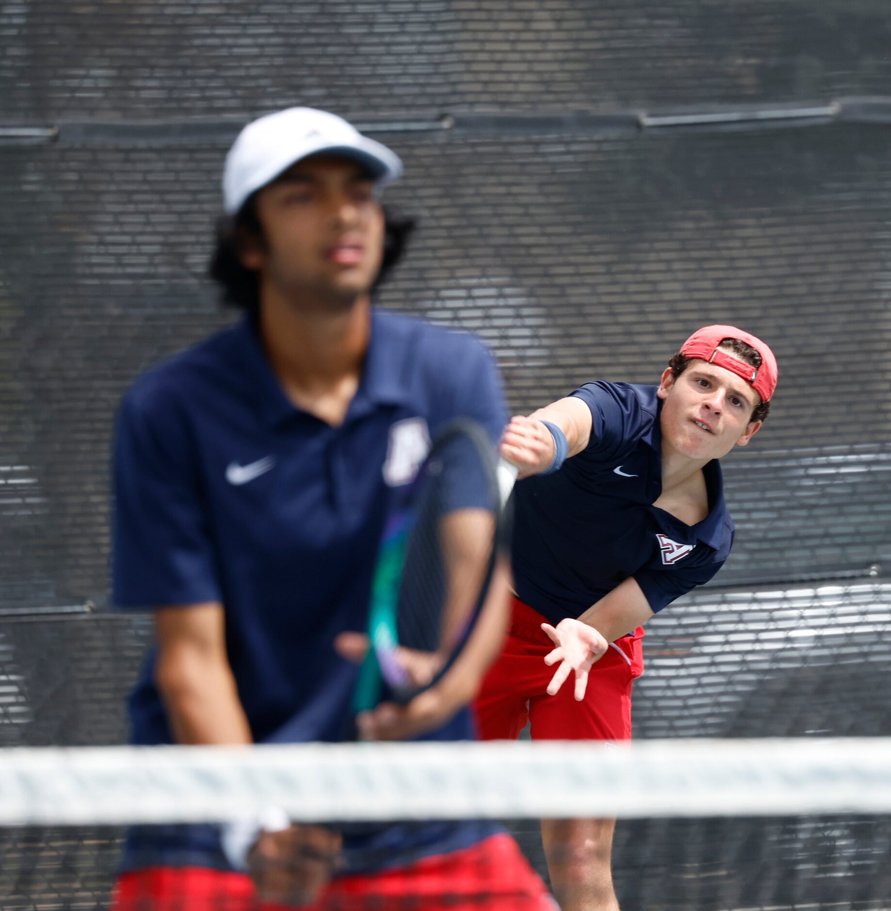 In Class 6A boys doubles Allen’s Tejas Ram waits as  Noah Hakim hits a serve against...