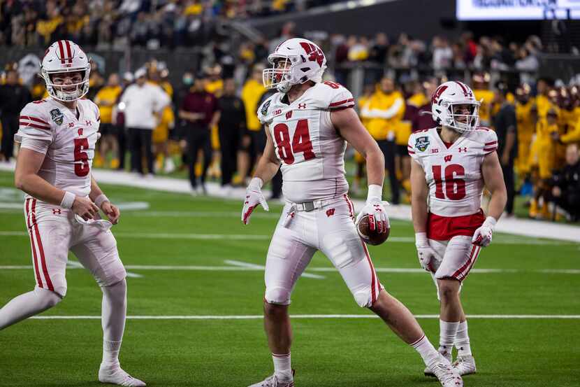 Wisconsin Badgers tight end Jake Ferguson (84) celebrates a touchdown during an NCAA College...