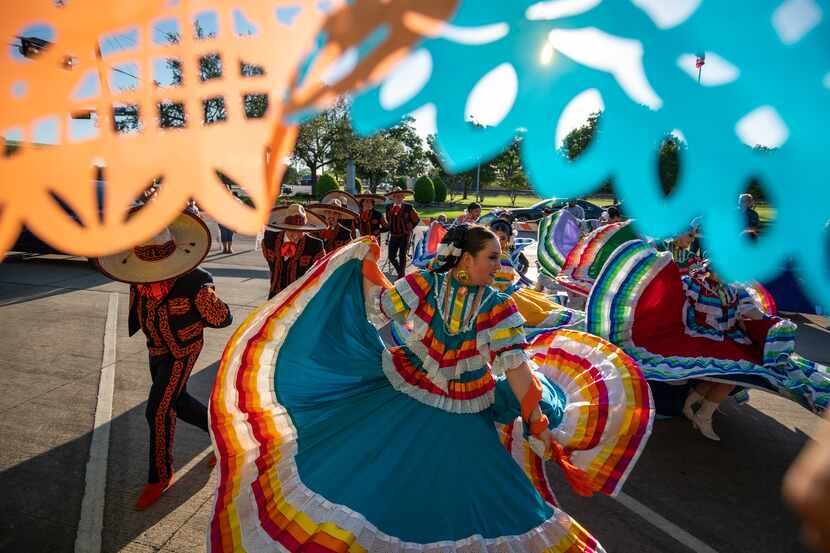 Jazmine Gutierrez, 21, of Alegre Ballet Folklorico, performs a traditional dance from the...