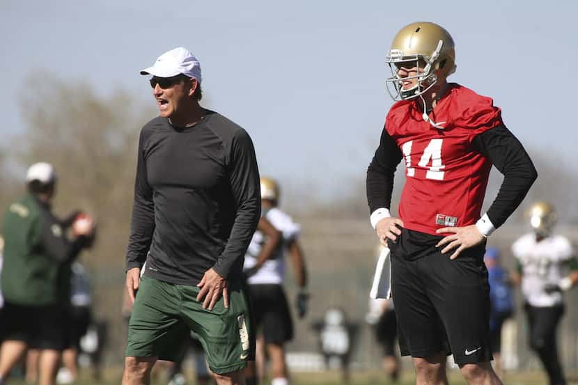 Baylor coach Art Briles, left, and starting quarterback Bryce Petty watch during the first...