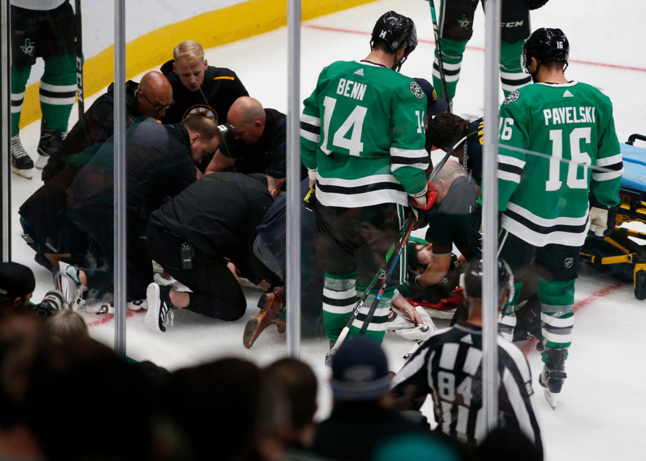 The medical team tends to injured player Dallas Stars defenseman Roman Polak (45) in a game...