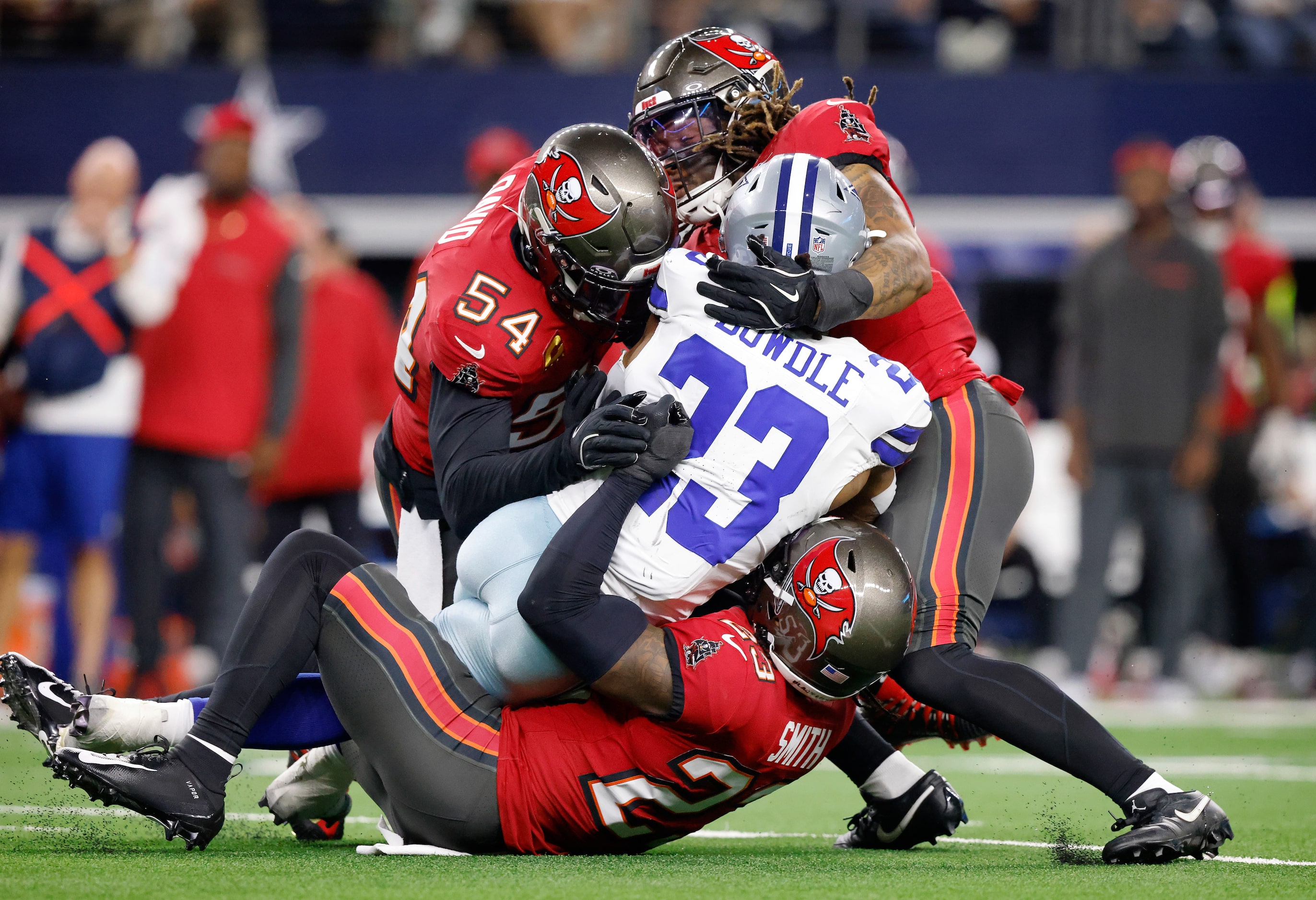 Tampa Bay Buccaneers linebacker Lavonte David (54) and safety Tykee Smith (23) and...