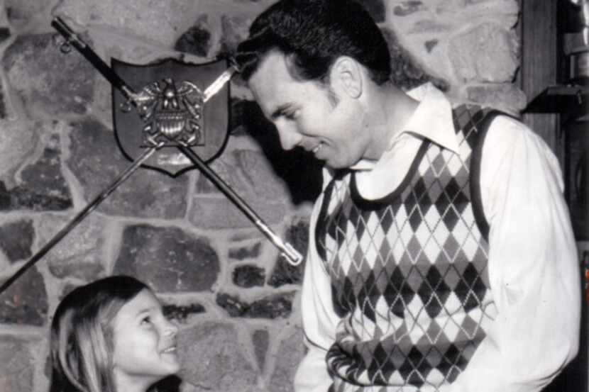 Jennifer Staubach and dad Roger Staubach struck a pose for a story on Girl Scout cookies in...