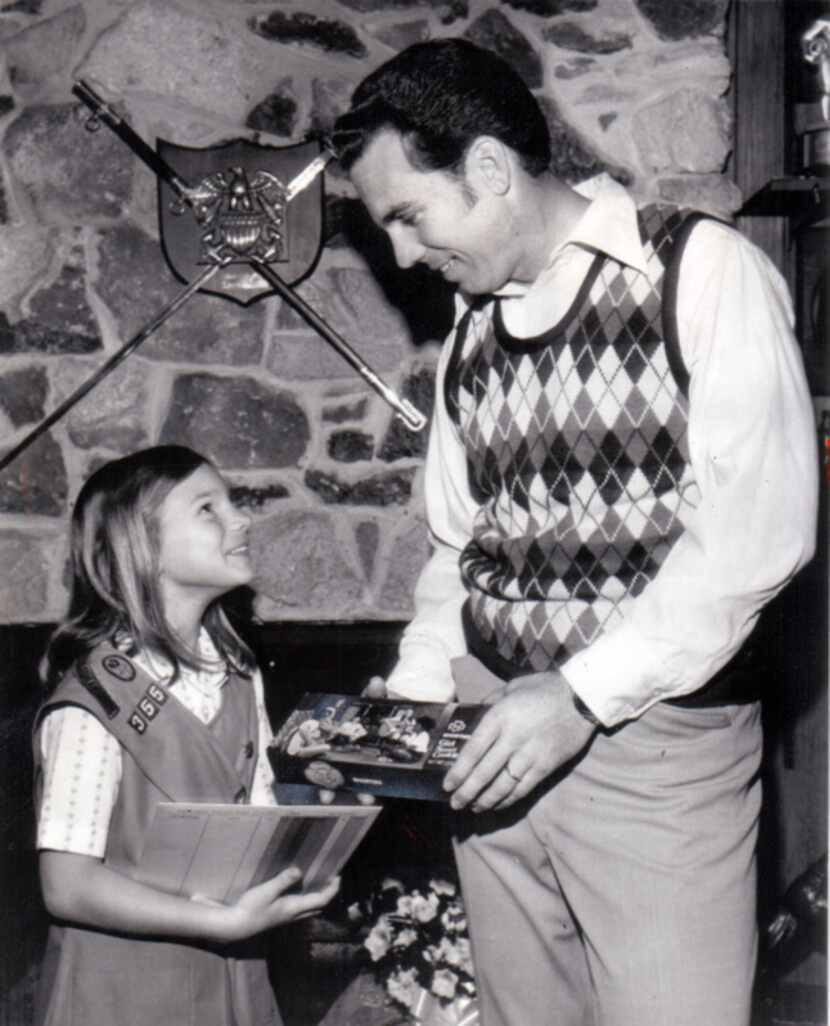 Jennifer Staubach and dad Roger Staubach struck a pose for a story on Girl Scout cookies in...