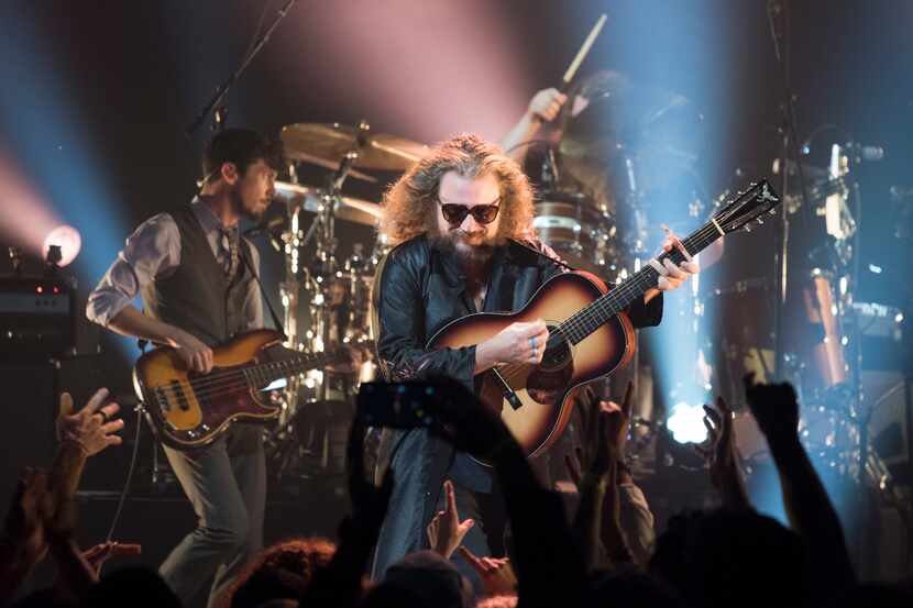 Jim James, foreground, lead vocalist and guitarist, and Tom Blankenship, bass guitarist,...