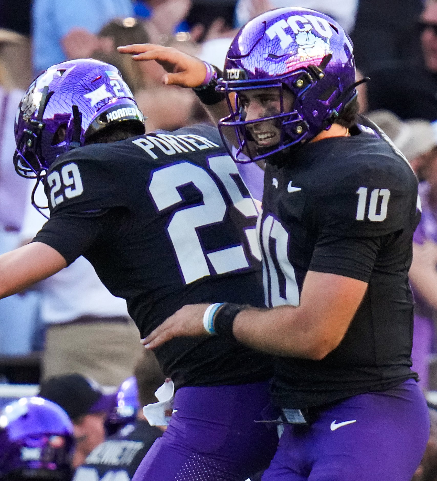 TCU quarterback Josh Hoover (10) celebrates with Jacob Porter (29) after connecting with...