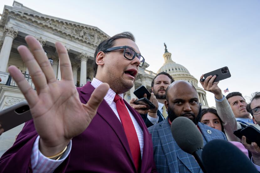 Rep. George Santos, R-N.Y., speaks to reporters outside after an effort to expel him from...