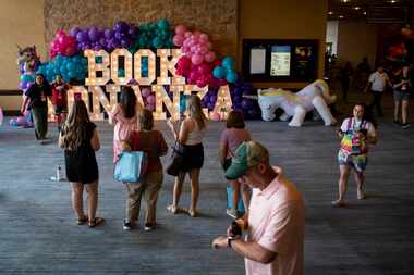 People walk around at the fourth annual Book Bonanza charity event at the Gaylord Texan...