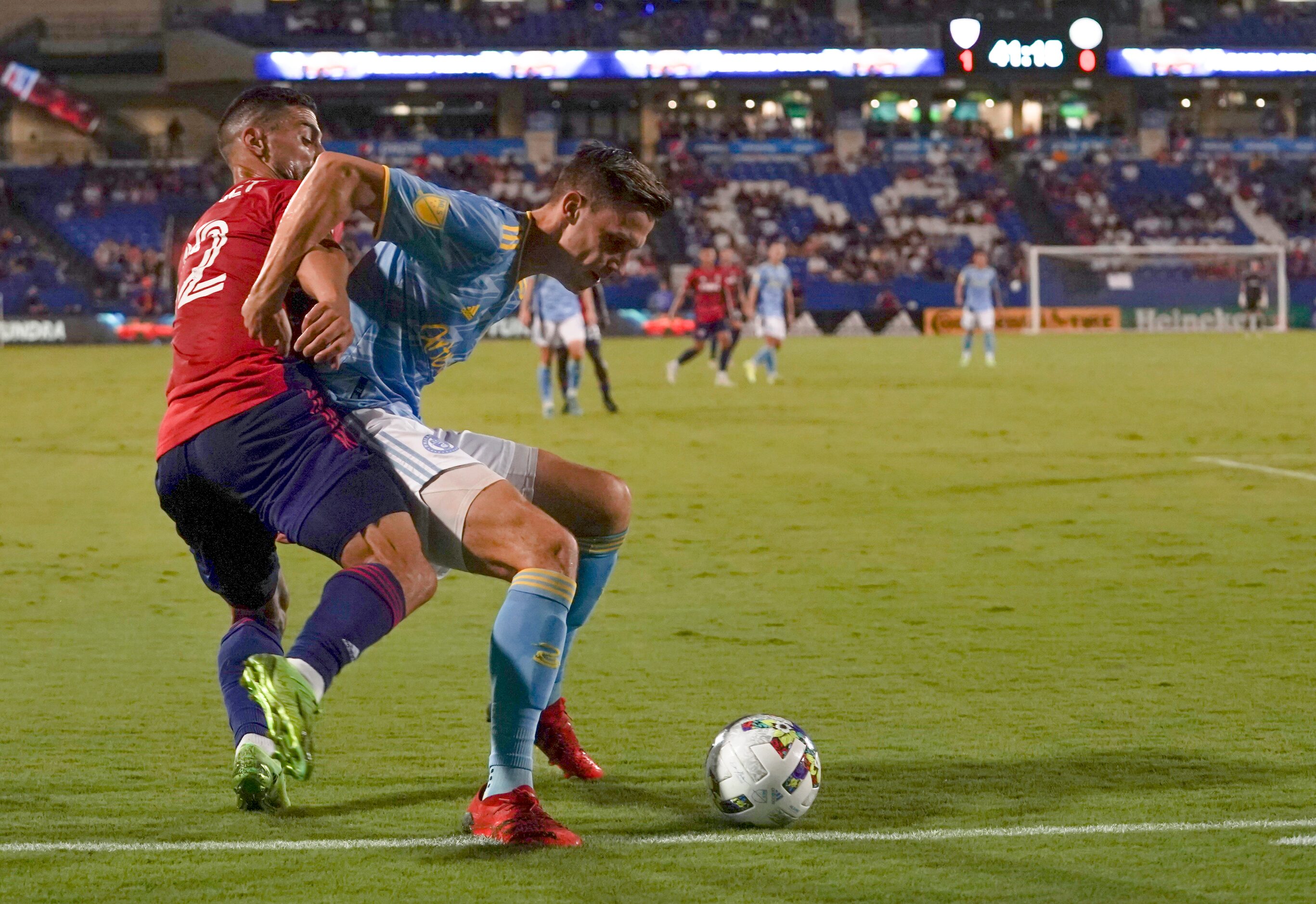 FC Dallas midfielder Sebastian Lletget (12) and Philadelphia Union defender Jack Elliott (3)...