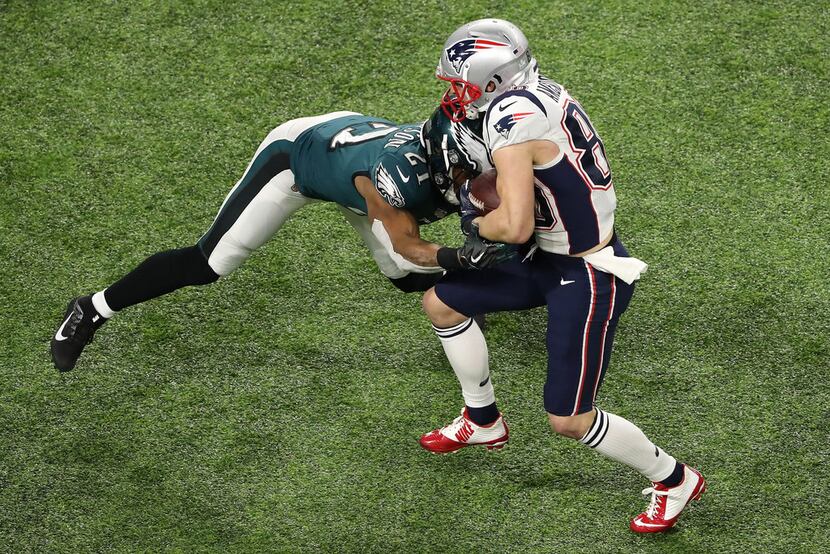 MINNEAPOLIS, MN - FEBRUARY 04: Danny Amendola #80 of the New England Patriots is tackled by...