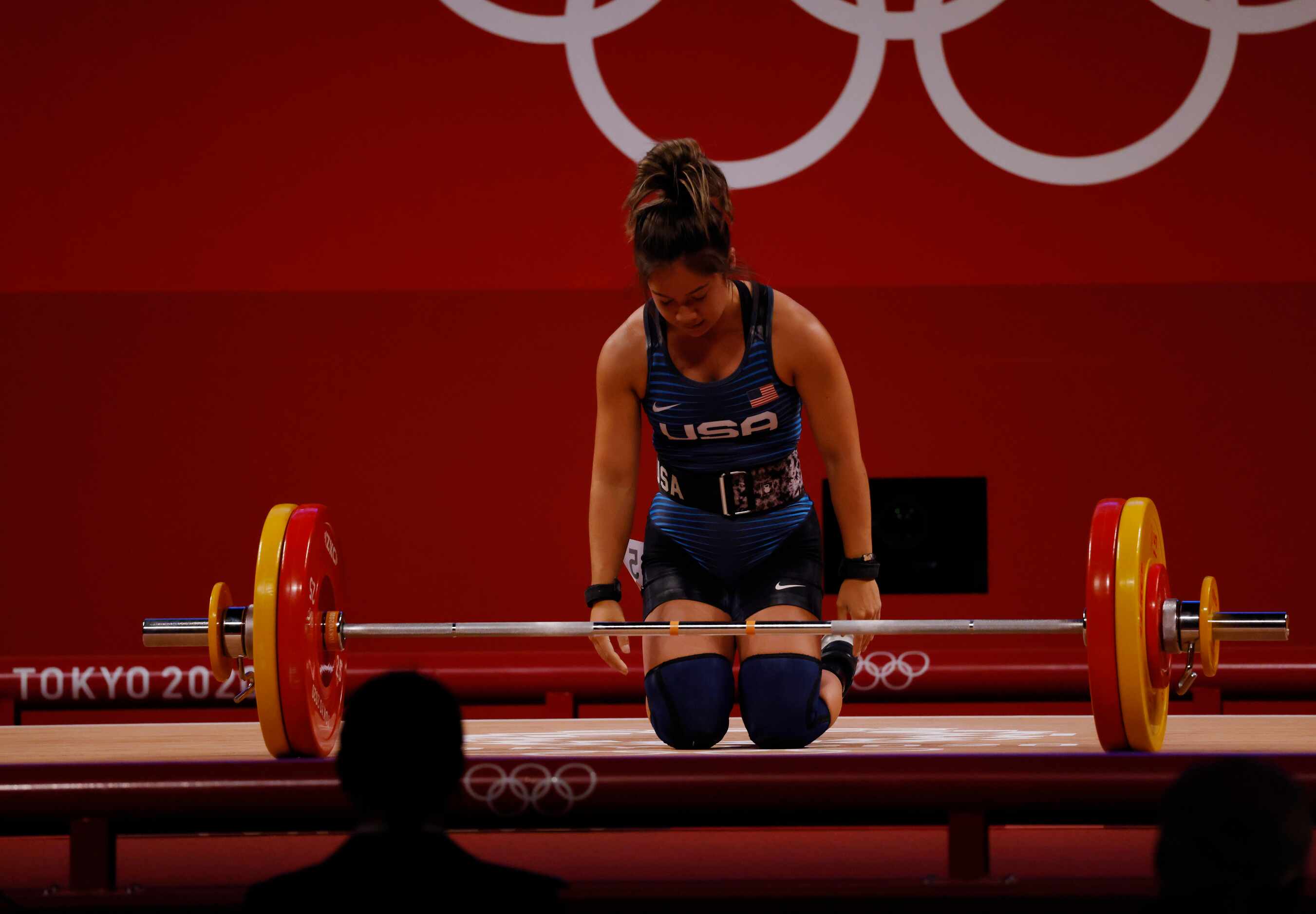 USA’s Jourdan Delacruz dejected after an unsuccessful attempt in lifting 108 kg on her third...