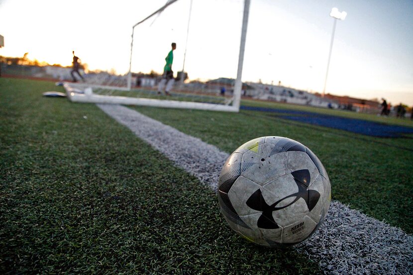 The teams warm up as Summit High School hosted Waxahachie High School in a soccer match at...