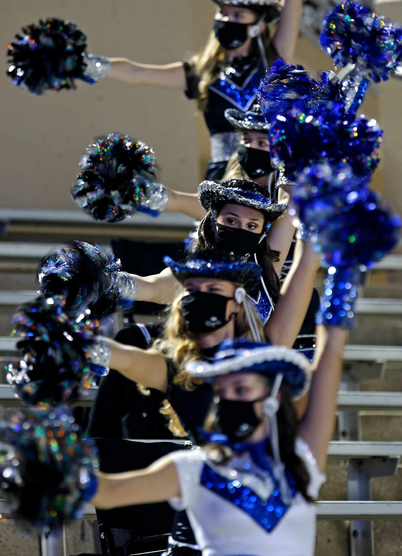 The Plano West High School Royals drill team performs before kickoff as Plano West High...
