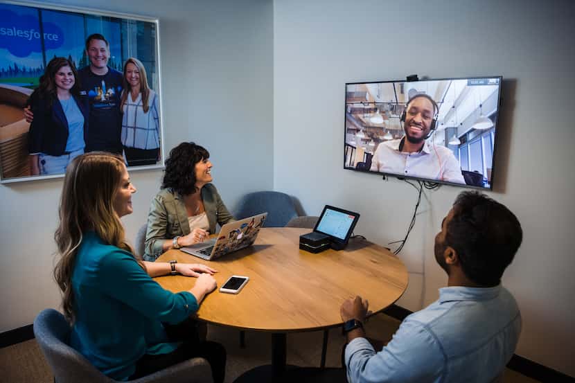 Salesforce employees catch up in a meeting that's part video, part live.