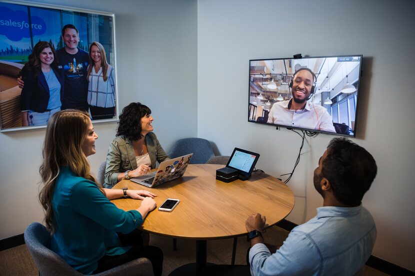 Salesforce employees catch up in a meeting that's part video, part live.