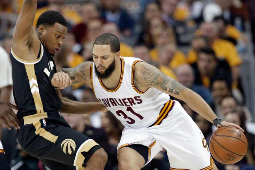 Cleveland Cavaliers' Deron Williams (31) fouls Toronto Raptors' Kyle Lowry (7) during the...