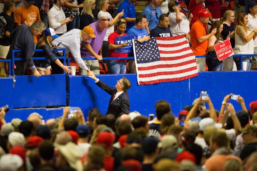 Texas Lt. Gov. Dan Patrick greeted supporters during a rally for Donald Trump last month at...