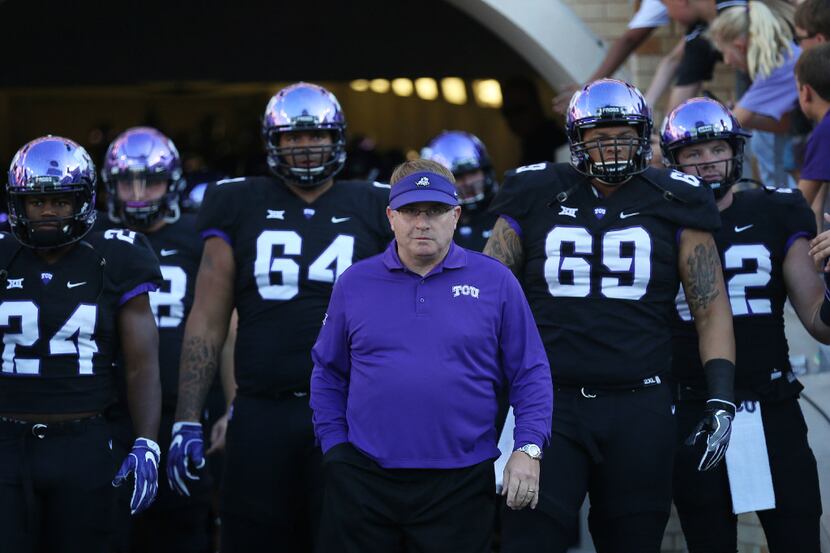 TCU head coach Gary Patterson prepares to enter the field with his players before an NCAA...