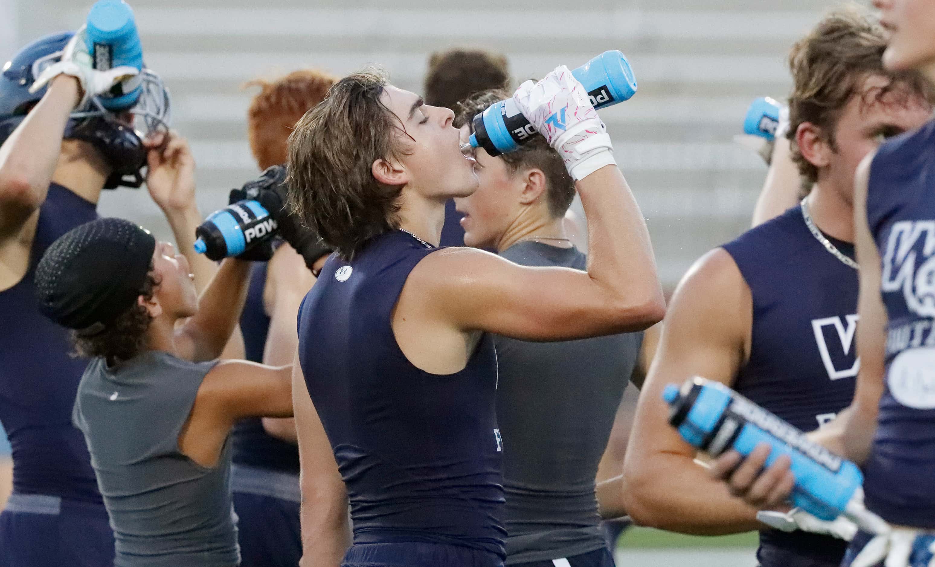 The team took frequent watert breaks throughout the practice as Walnut Grove High School...