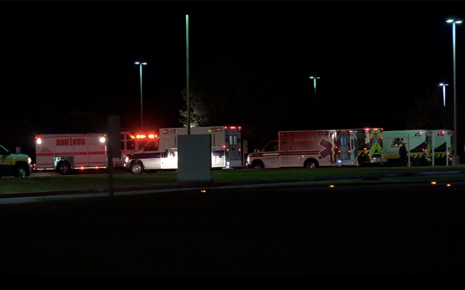 Ambulances stand by outside Baylor Scott and White Medical Center — Centennial in Frisco on...