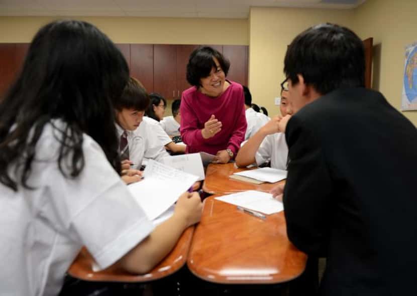 
Chinese language teacher May Shen talks to Chinese exchange students during a lesson at the...