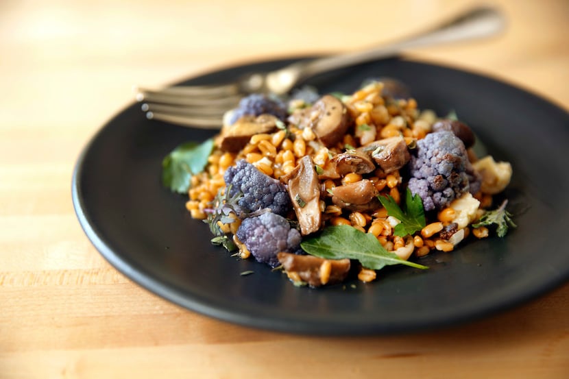 Sachet co-owner and chef Stephen Rogers prepared a Farro Salad with Mushrooms at his Oak...