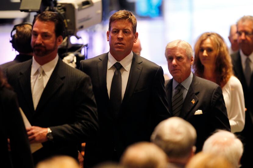 Former Dallas Cowboys player Troy Aikman departs the sanctuary following the celebration...
