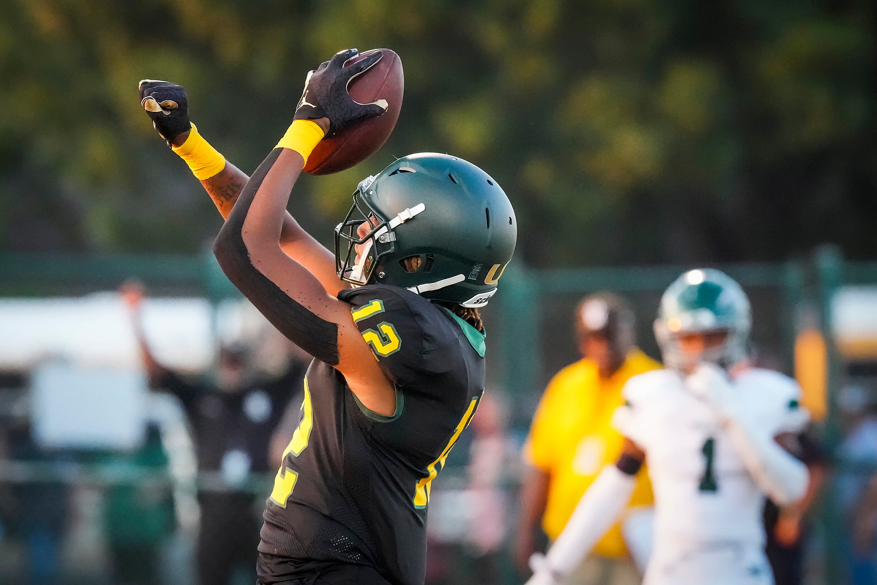 DeSoto wide receiver Jaxson Davis (12) celebrates after scoring on a touchdown pass from...