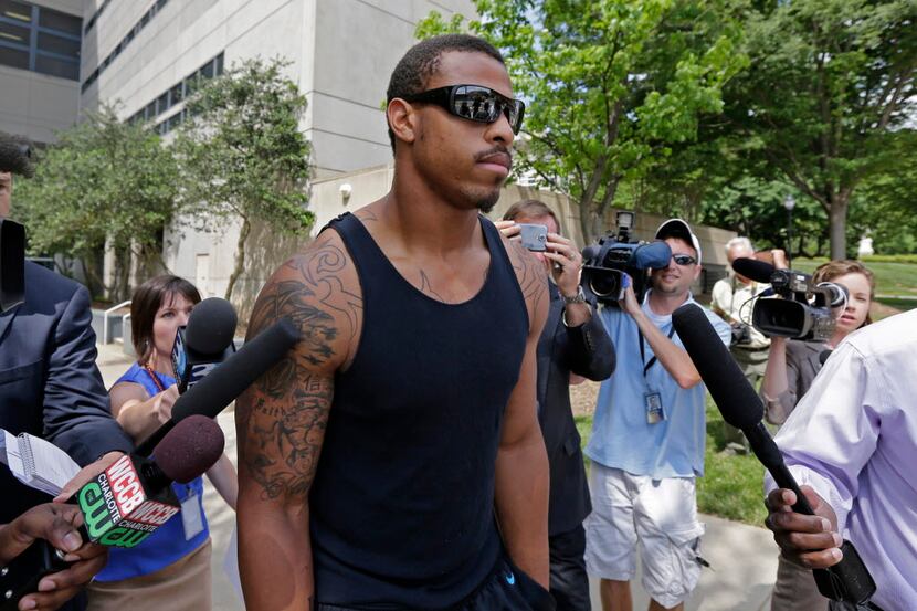  Greg Hardy leaves a Charlotte, N.C., jail last year after he was charged with beating up...